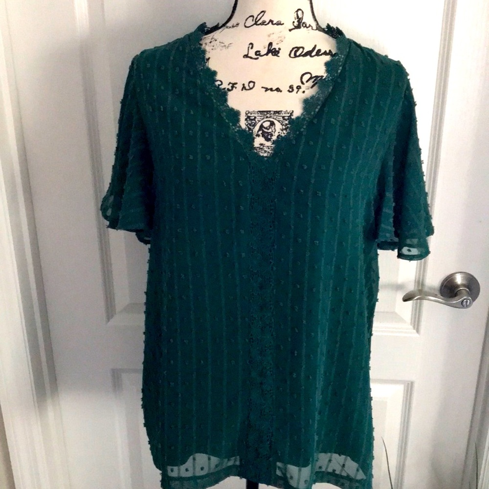 Top with sheer overlay.